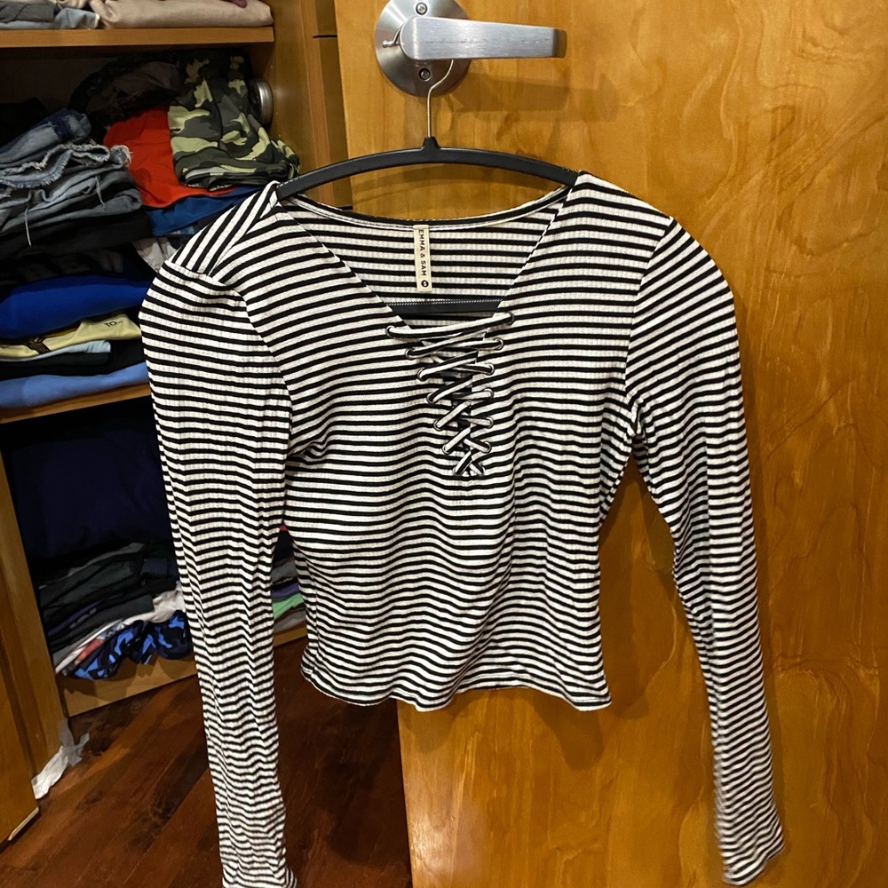 Black and white striped long sleeve lace up top